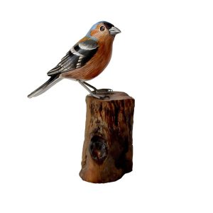 Chaffinch on tree trunk, hand carved wooden